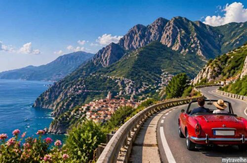 European road trip on scenic coastal highway with vintage car.