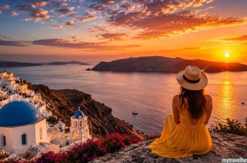 Traveler watching a stunning sunset over a coastal destination.
